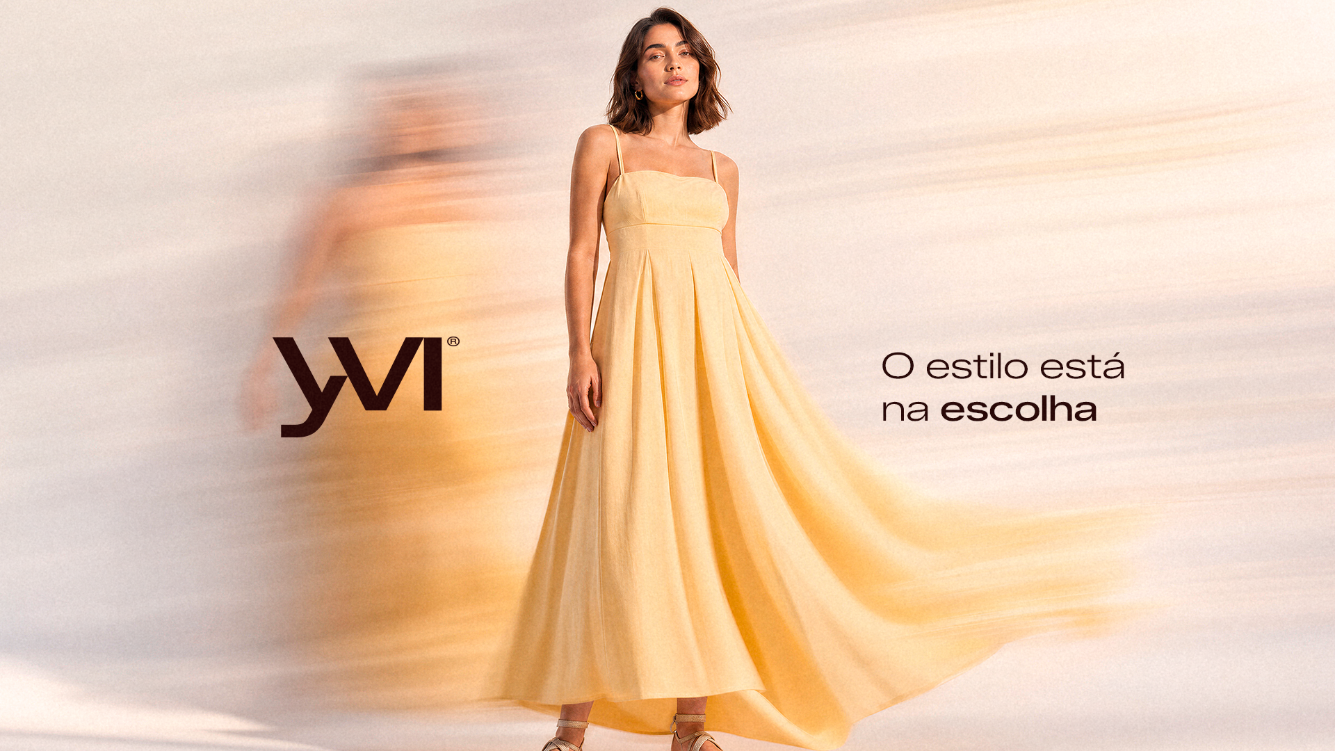 Yvi campaign showing a model in a flowing yellow dress beside the logo and the message “O estilo está na escolha.”