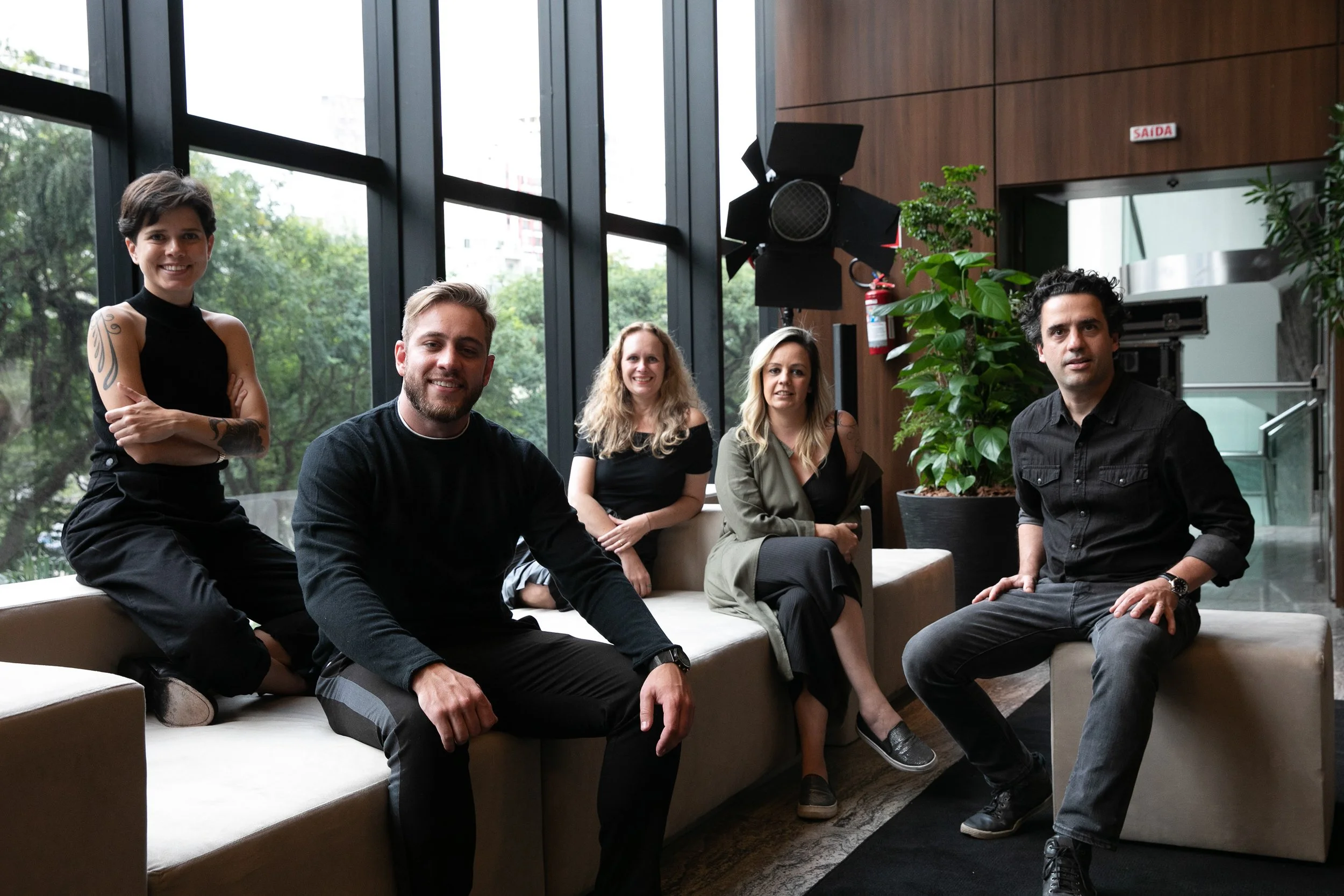 The Public House team seated together in the studio