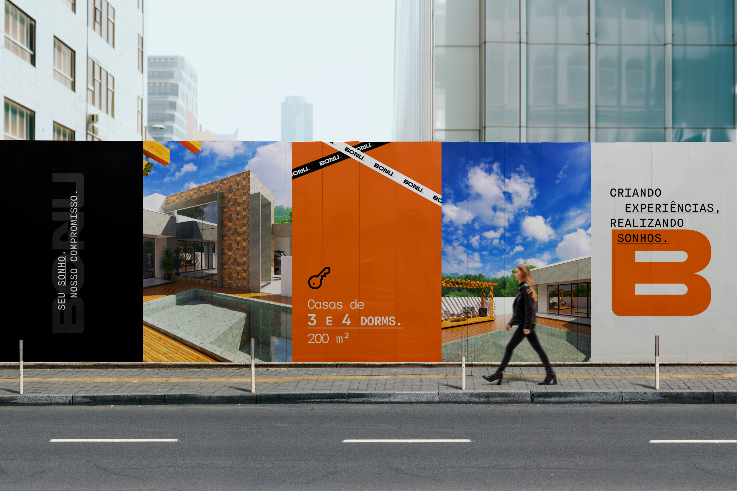 BONU development hoarding with orange and black identity panels, architectural renderings and the brand monogram.