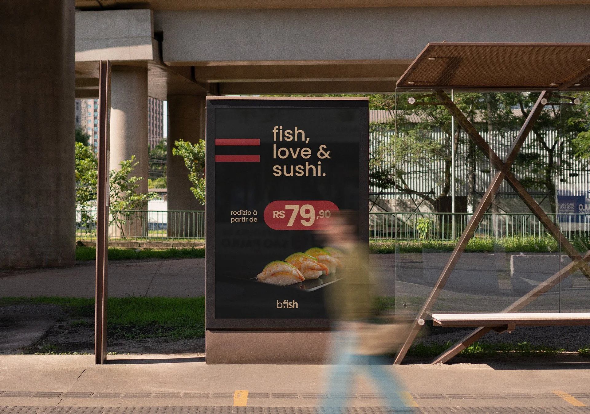 Black Fish bus shelter advertisement featuring sushi photography, the restaurant tagline and promotional price.