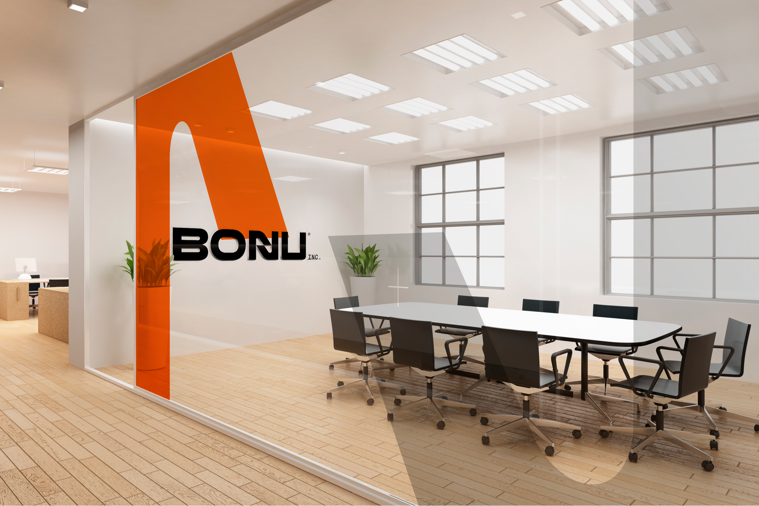 BONU office interior with a glass meeting room, black wordmark and large orange brand graphic.